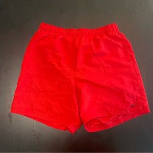 Nike Red Men’s Large swim trunks.